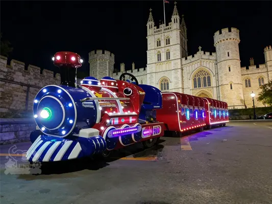 The main color scheme is deep blue with vintage gold and white trim, recreating the silhouette of a Victorian-era steam locomotive. The carriage is decorated with wood grain textures, exuding a retro feel.